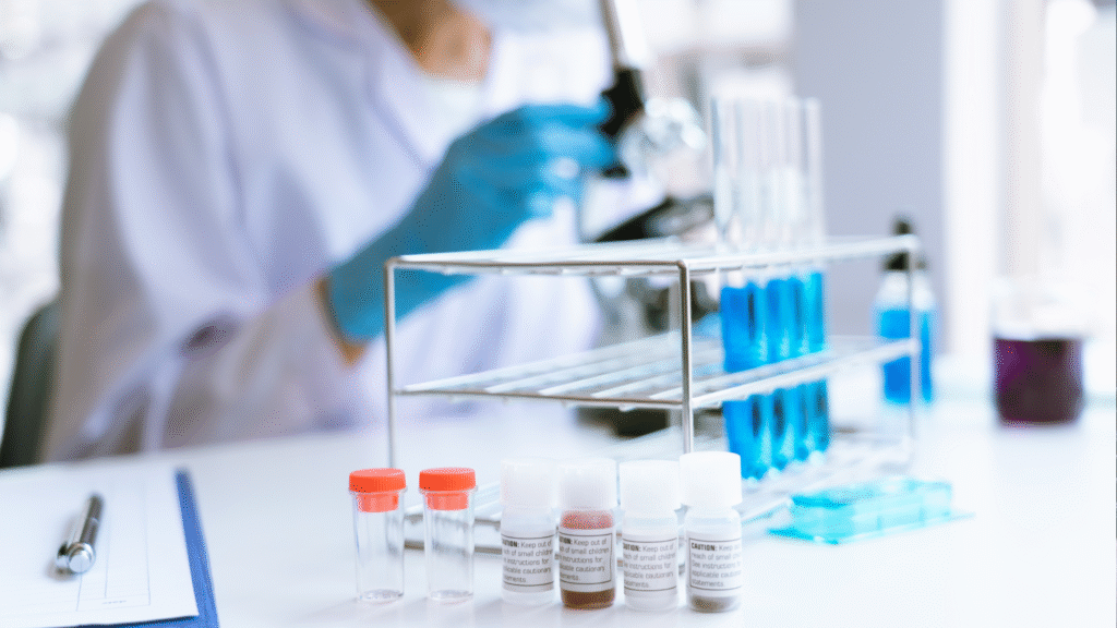 Water treatment lab with test tubes, reagents, and a technician analyzing samples related to chlorine pH levels.