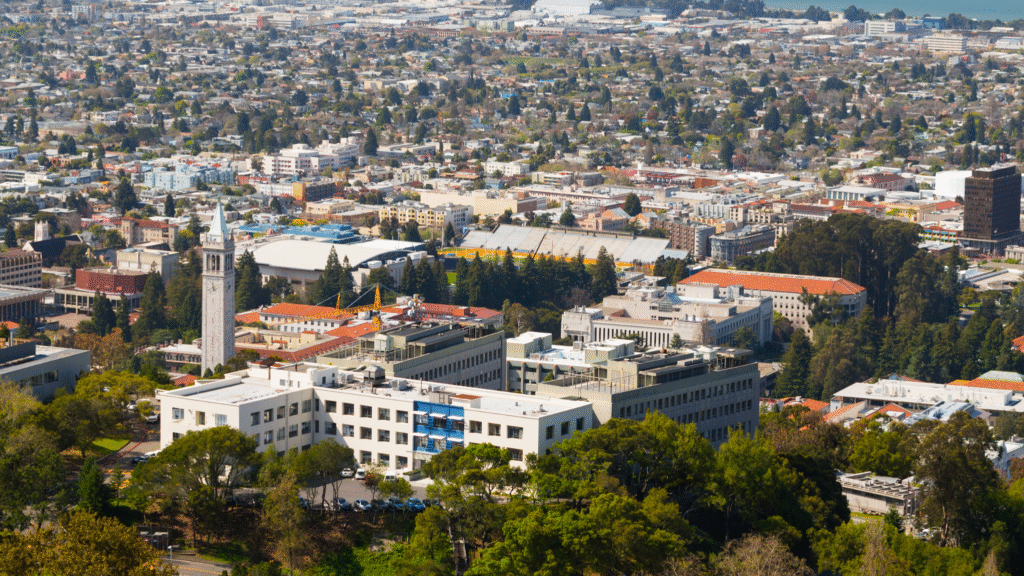 Aerial view of a university campus with dorms and recreational facilities, highlighting the need for Legionella management.