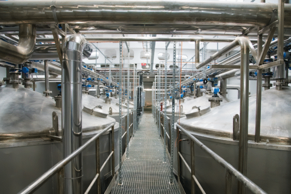 Modern food and beverage facilities rely on clean-in-place systems and proper water management to prevent wastewater odor emissions.