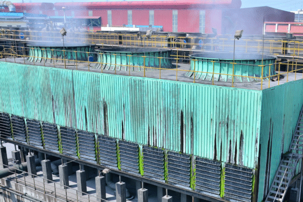 Industrial cooling tower drift eliminators capturing water droplets and minimizing drift in exhaust air