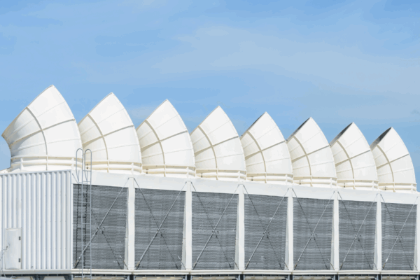 Industrial cooling water system with large induced-draft cooling towers used for heat transfer.