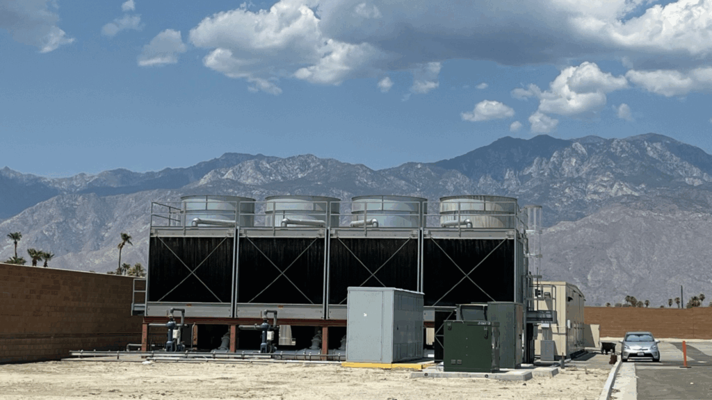 Cooling towers at a facility, a key focus of a water management plan for building water systems.